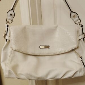 White crocodile-embossed faux leather handbag featuring silver hardware!